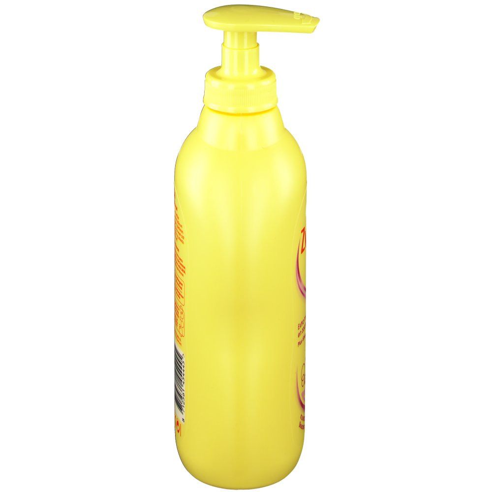 Gele fles met doseerpomp, zijaanzicht. Geen verdere details zichtbaar.