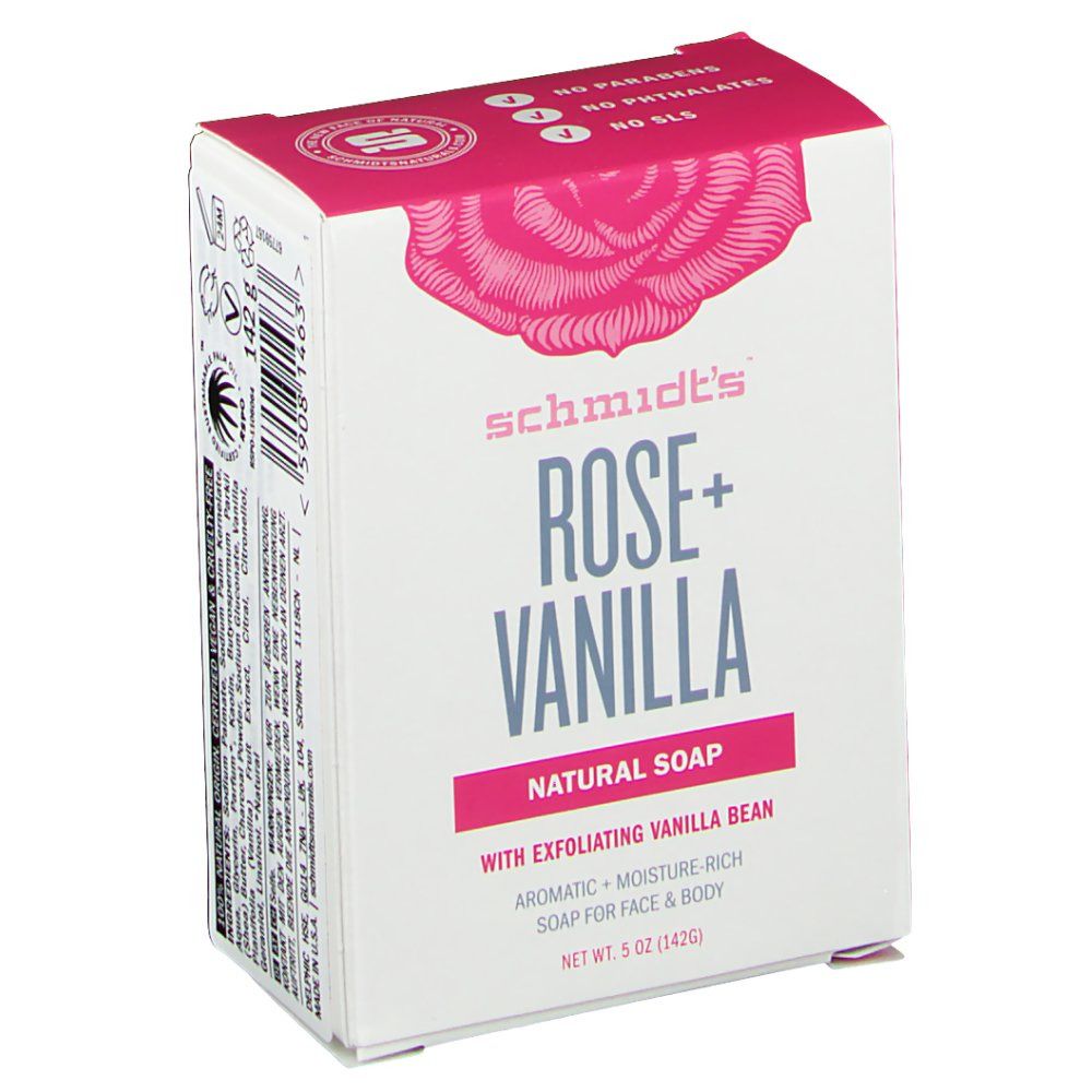 Doos met roze deksel. Opschrift: Schmidt's Rose + Vanilla Natural Soap. Achterkant met tekst en logo's. Rozenillustratie.