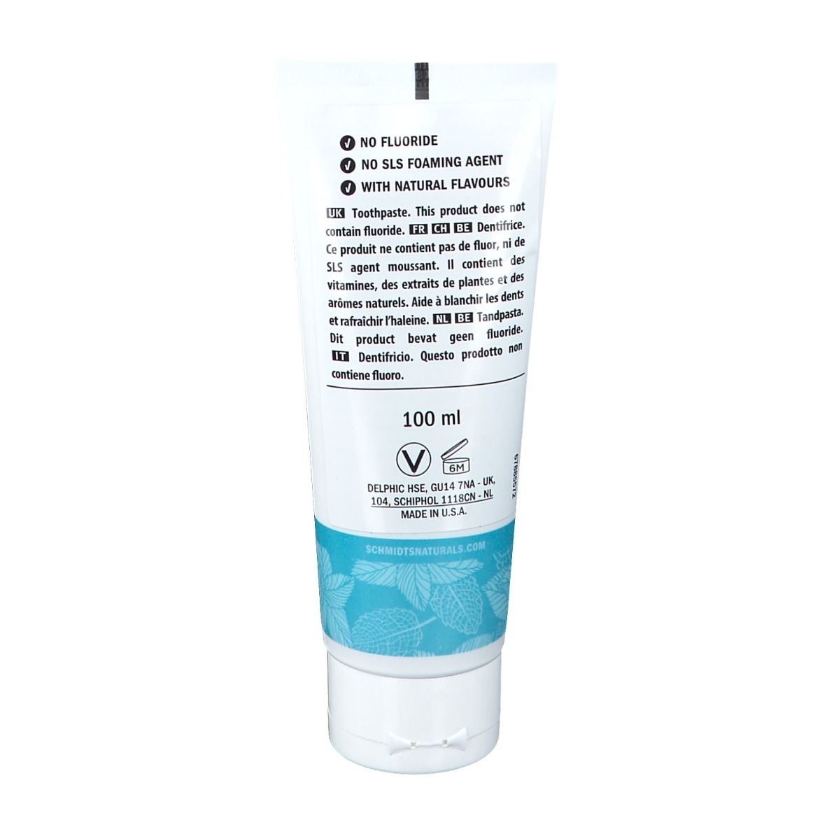 Achterkant van de tandpastatube. Bevat informatie over ingrediënten en certificeringen. 100 ml.