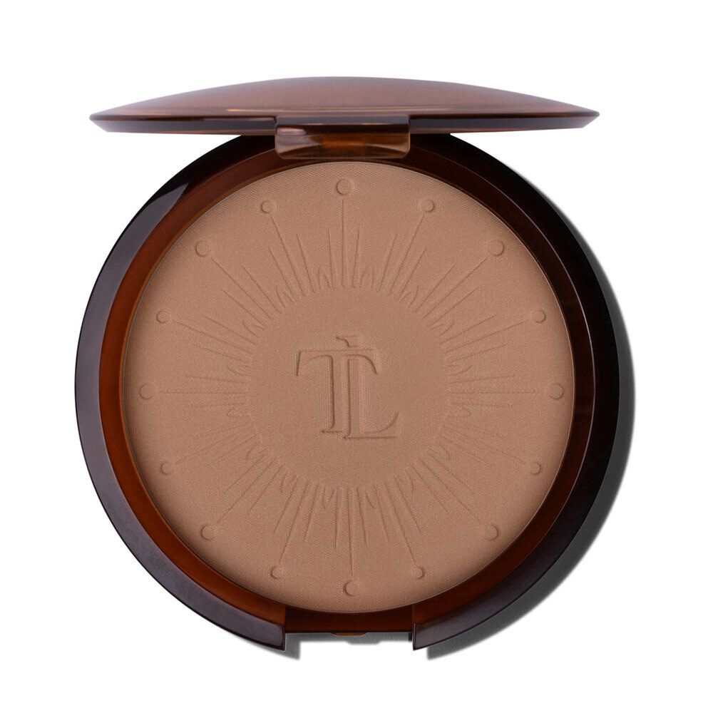 Poudre de soleil T. LeClerc. Poudrier brun ouvert. Miroir et poudre avec motif.