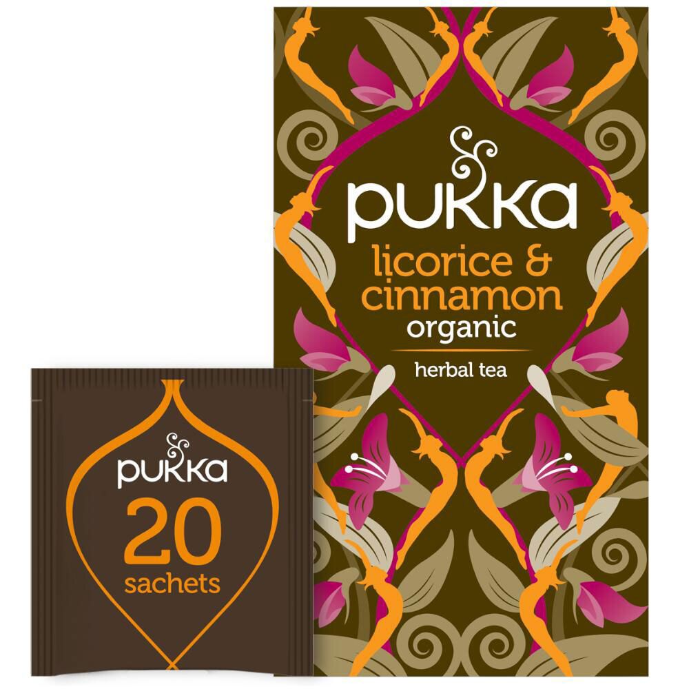 Sachet et boîte de thé Pukka. Inscription: Réglisse & Cannelle, 20 sachets. Emballage marron avec motif floral.
