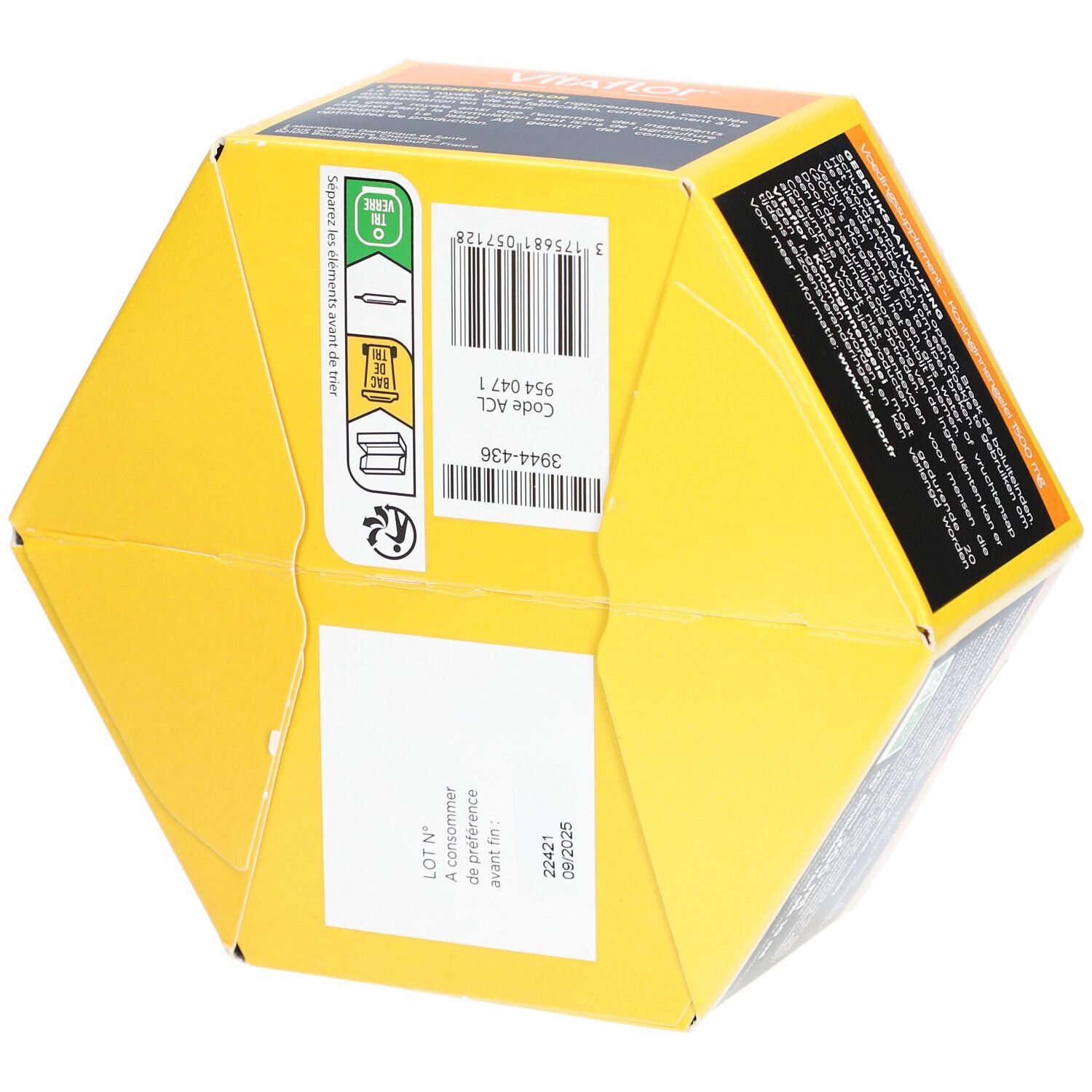 Sechseckige Verpackung. Aufschrift: Vitaflor. Barcode und Chargennummer. Bio-Siegel. Format 20 Tage. Text in Niederländisch.