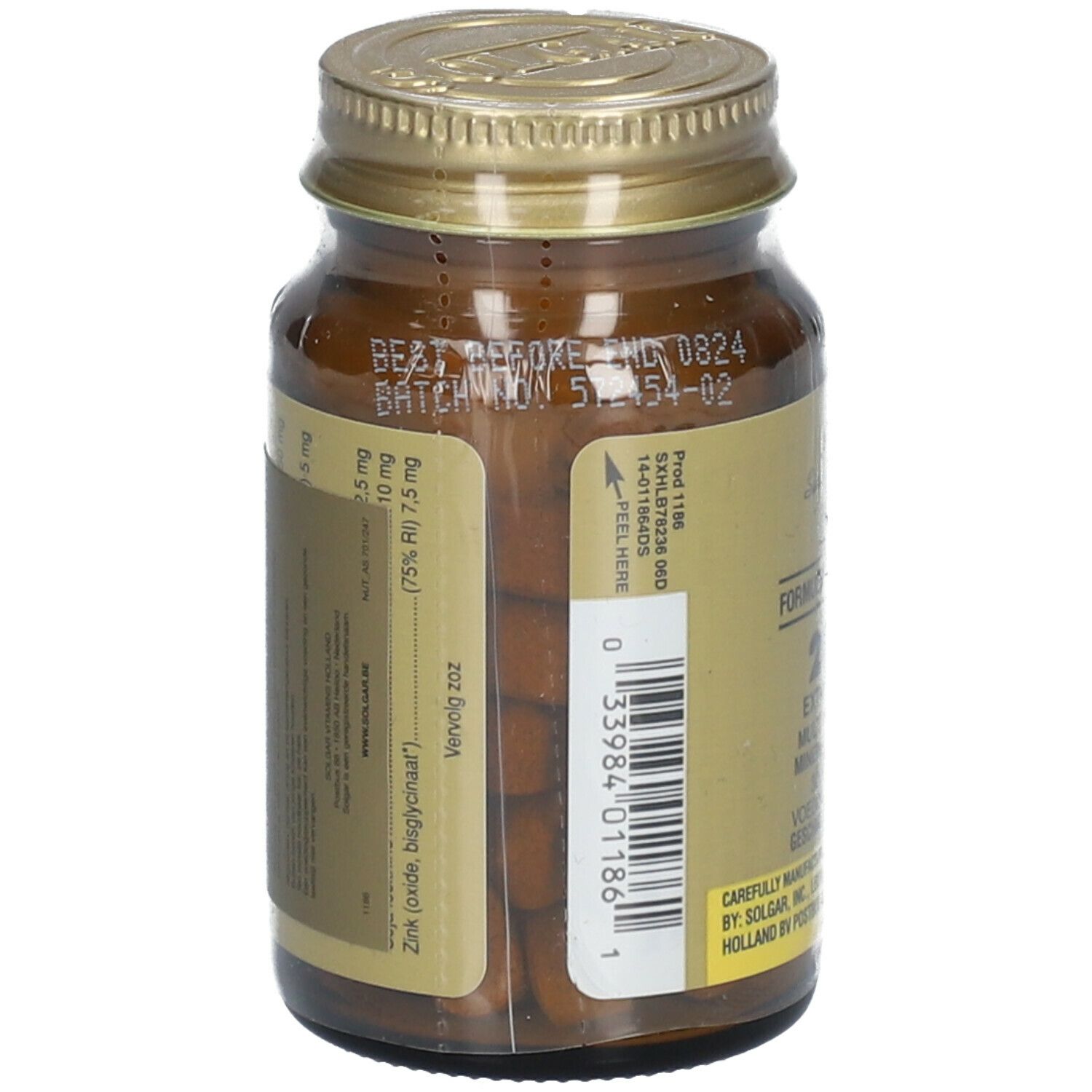 Flacon en verre brun avec bouchon doré. Vue sur les comprimés. Code-barres et informations sur l'étiquette.