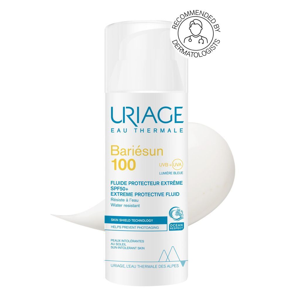 Witte fles URIAGE Bariésun 100 Fluid. SPF50+ zonbescherming. Waterbestendig. Blauwe en gele tekst.