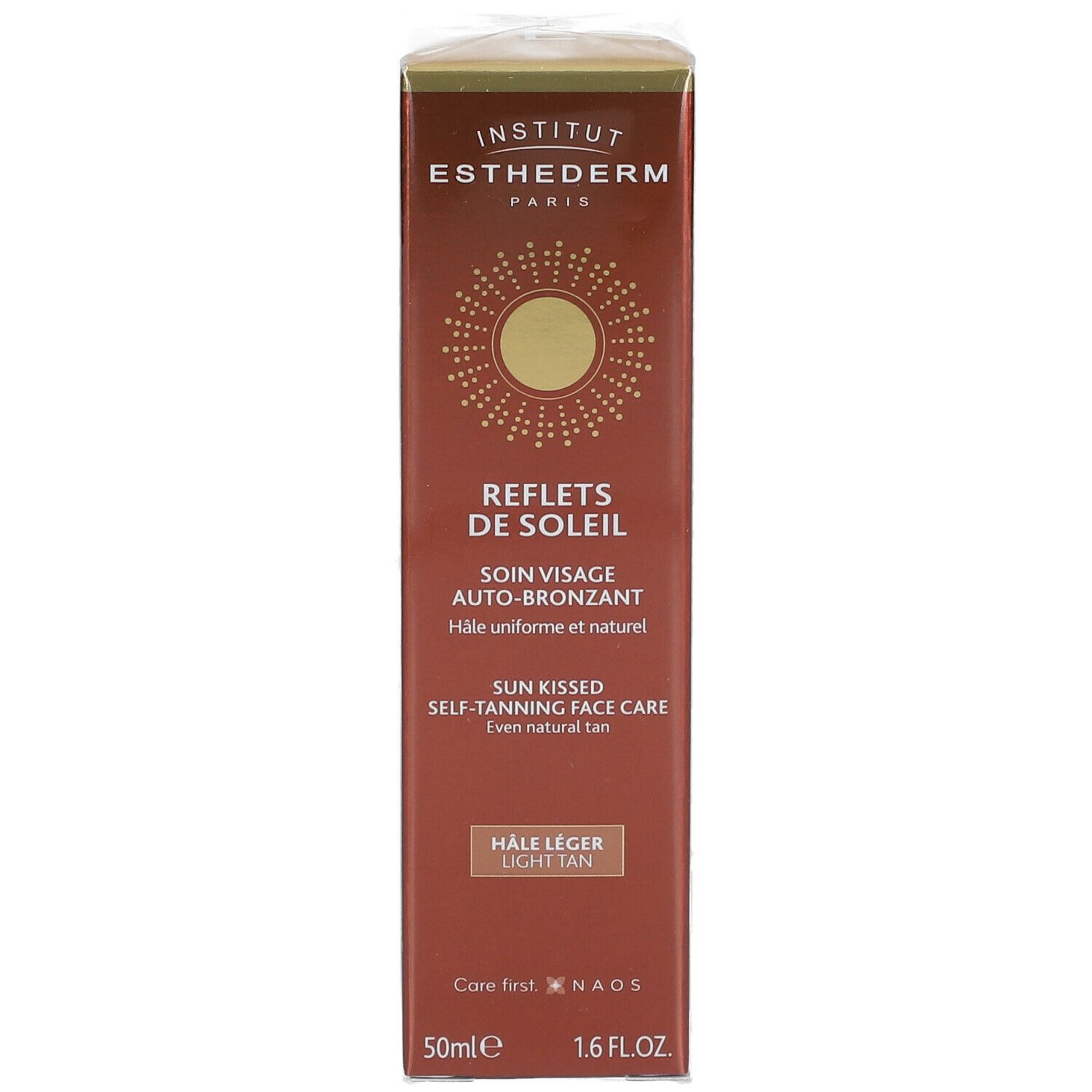 Boîte marron avec informations produit. Inscriptions: INSTITUT ESTHEDERM PARIS, REFLETS DE SOLEIL, SOIN VISAGE AUTO-BRONZANT.