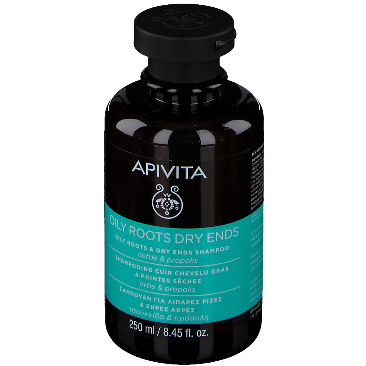 Dunkle Flasche mit schwarzem Deckel. Aufschrift: APIVITA, Oily Roots Dry Ends Shampoo. Türkisfarbenes Etikett.