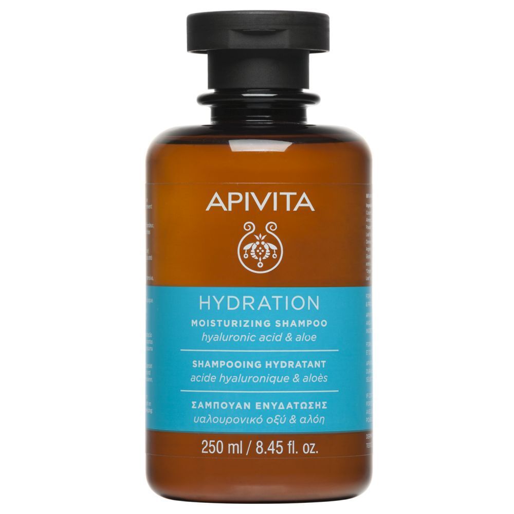 Flacon marron, bouchon noir. Inscription APIVITA HYDRATION Shampoo. Étiquette bleue avec texte. 250 ml.