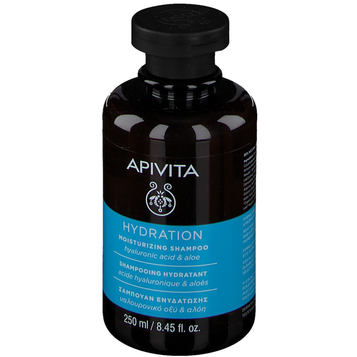 Flacon marron, bouchon noir. Inscription APIVITA HYDRATION Shampoo. Étiquette bleue avec texte. 250 ml.