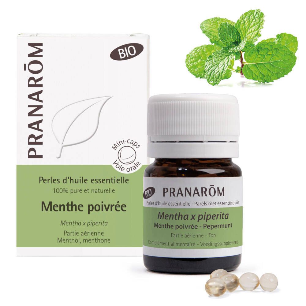 Braune Glasflasche mit weißen Kapseln und einer Schachtel. Aufschrift: Pranarôm, Menthe poivrée, Bio. Pfefferminzblätter.