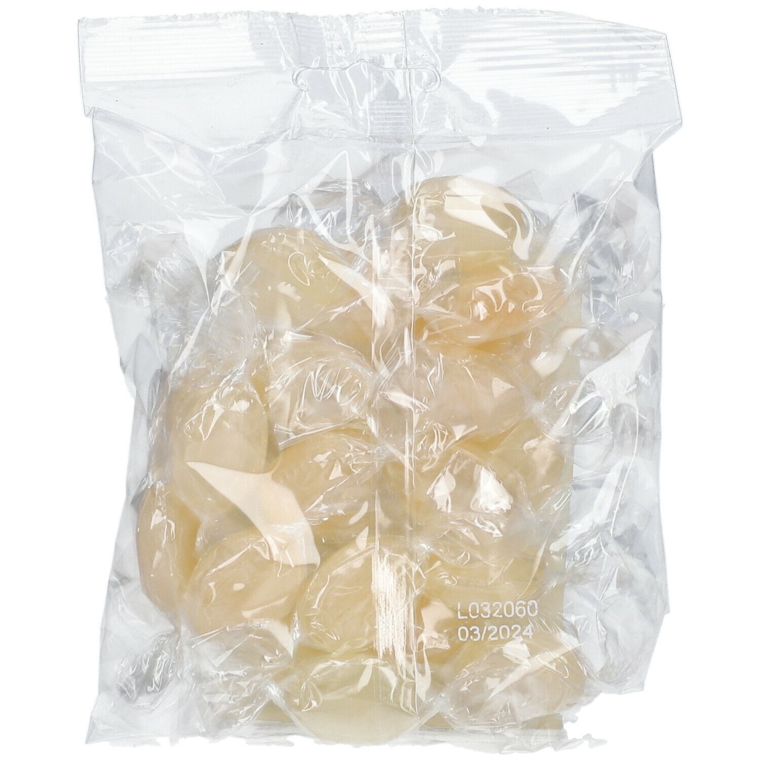 Emballage transparent avec bonbons emballés individuellement. Date de péremption visible: 03/2024.