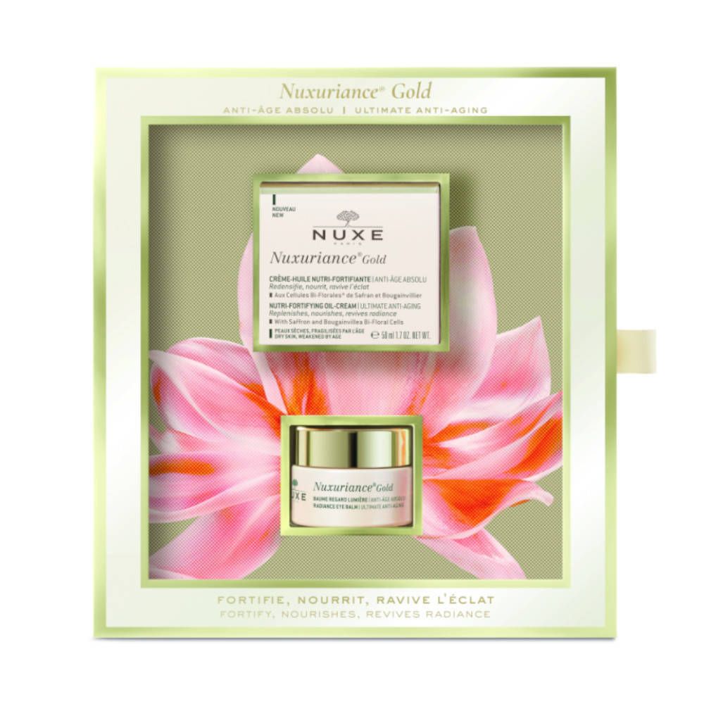 Coffret cadeau Nuxuriance Gold avec crème et pot. Motif floral en arrière-plan. Inscription Nuxe.
