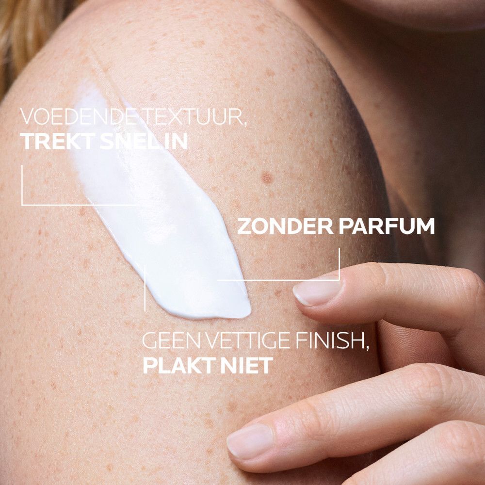 Witte fles met blauw logo. Tekst: LA ROCHE-POSAY, LIPIKAR BAUME AP+M. Dermatologische aanbeveling.