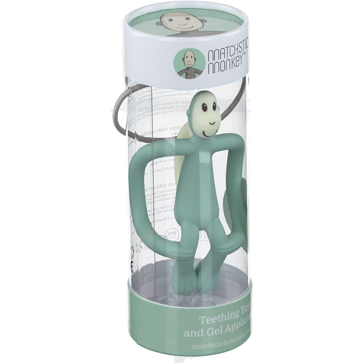 Anneau de dentition vert en cylindre. Emballage avec poignée. Inscription: MATCHSTICK MONKEY, Teething Toy and Gel Applicator.