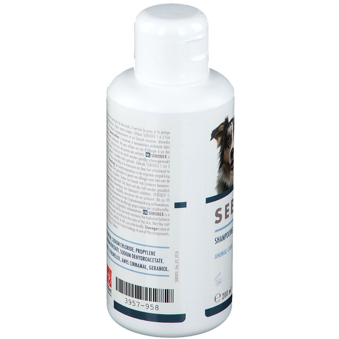 Rückseite der weißen Flasche SEBODEX Shampoo. Text in mehreren Sprachen. Inhaltsstoffe und Herstellerinformationen sind sichtbar.