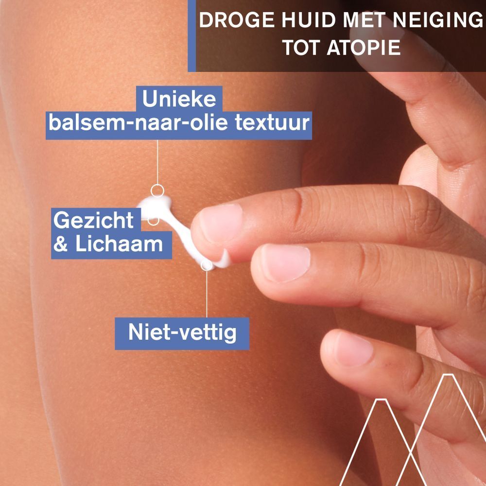 Uriage Bébé Xémose olie-balsem aangebracht op de huid. Nederlandse tekst.