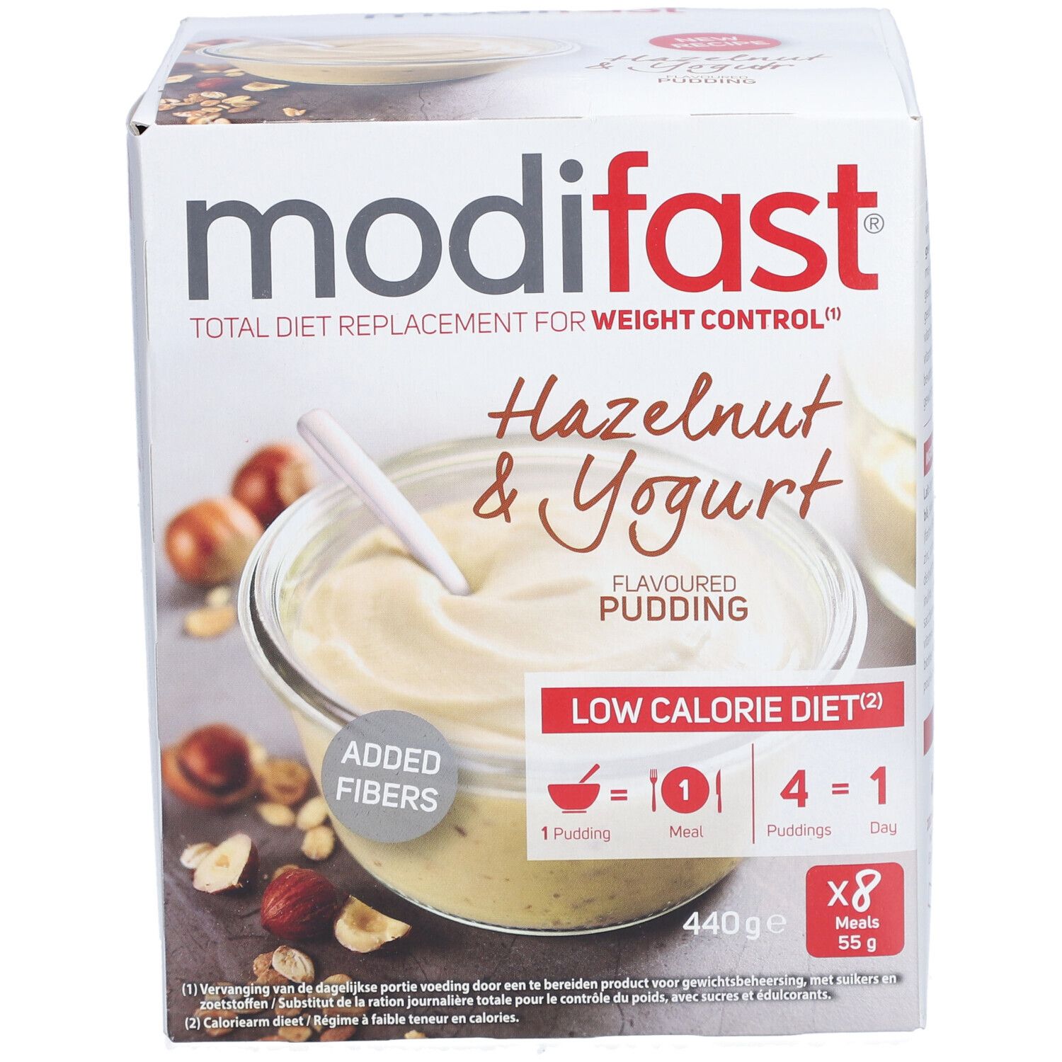 Boîte de Modifast Pudding Yaourt aux Noisettes. Pudding, noisettes et texte visibles. Contient 8 portions.