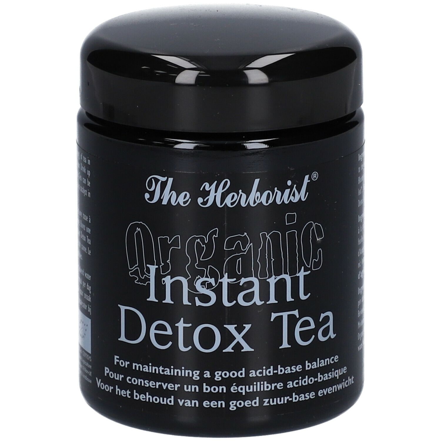 Schwarzes Glas mit Deckel. Aufschrift: The Herborist Organic Instant Detox Tea. Text in mehreren Sprachen.