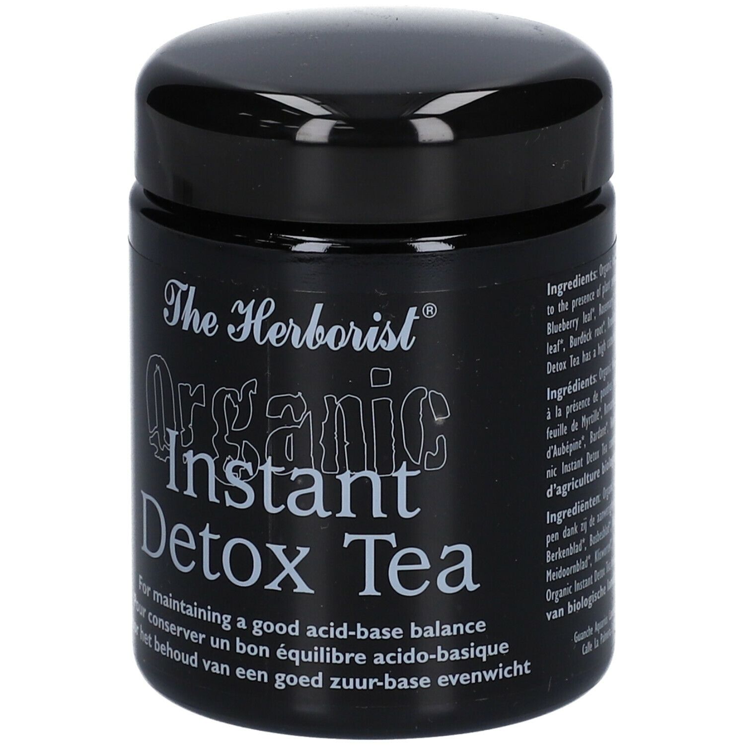 Schwarzes Glas mit Deckel. Aufschrift: The Herborist Organic Instant Detox Tea. Text in mehreren Sprachen.
