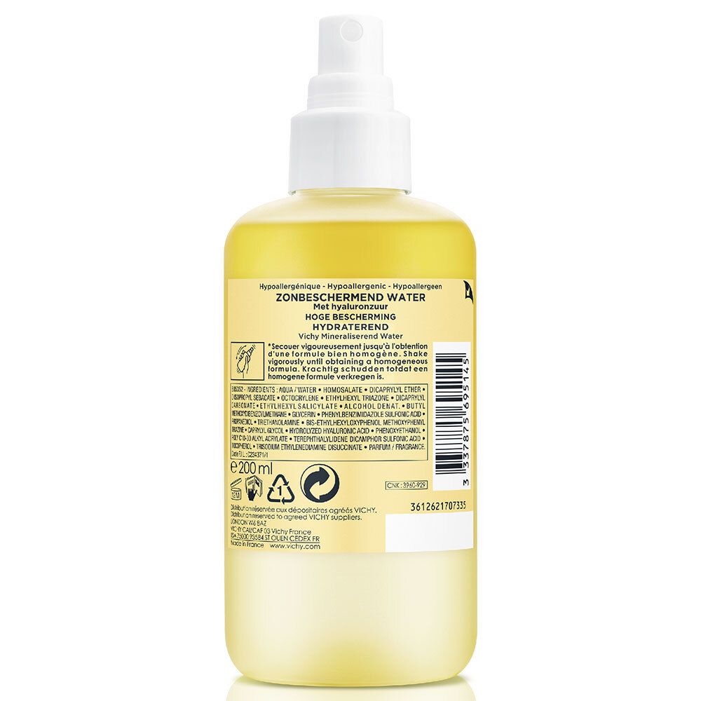 Achterkant van de gele fles. Tekst op etiket, ingrediënten, informatie.