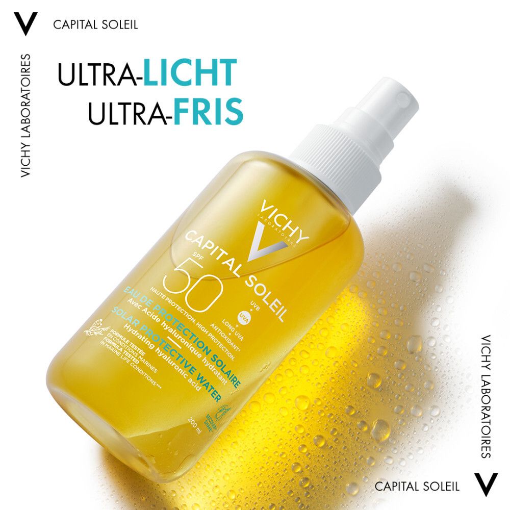 Gele fles met verstuiver. Vichy Capital Soleil SPF50, tekst op etiket.