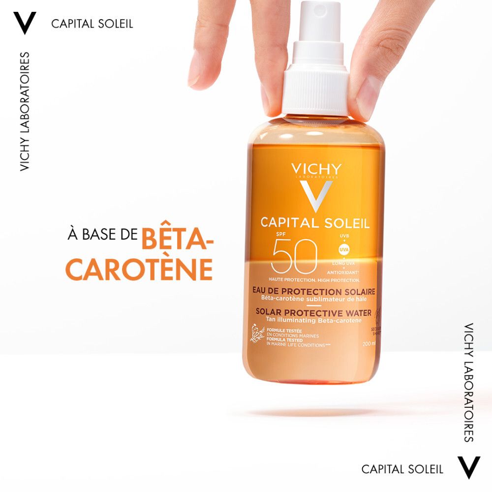 Vichy Capital Soleil Eau de protection solaire SPF50. Flacon orange avec vaporisateur. Nom du produit et SPF50 visibles.