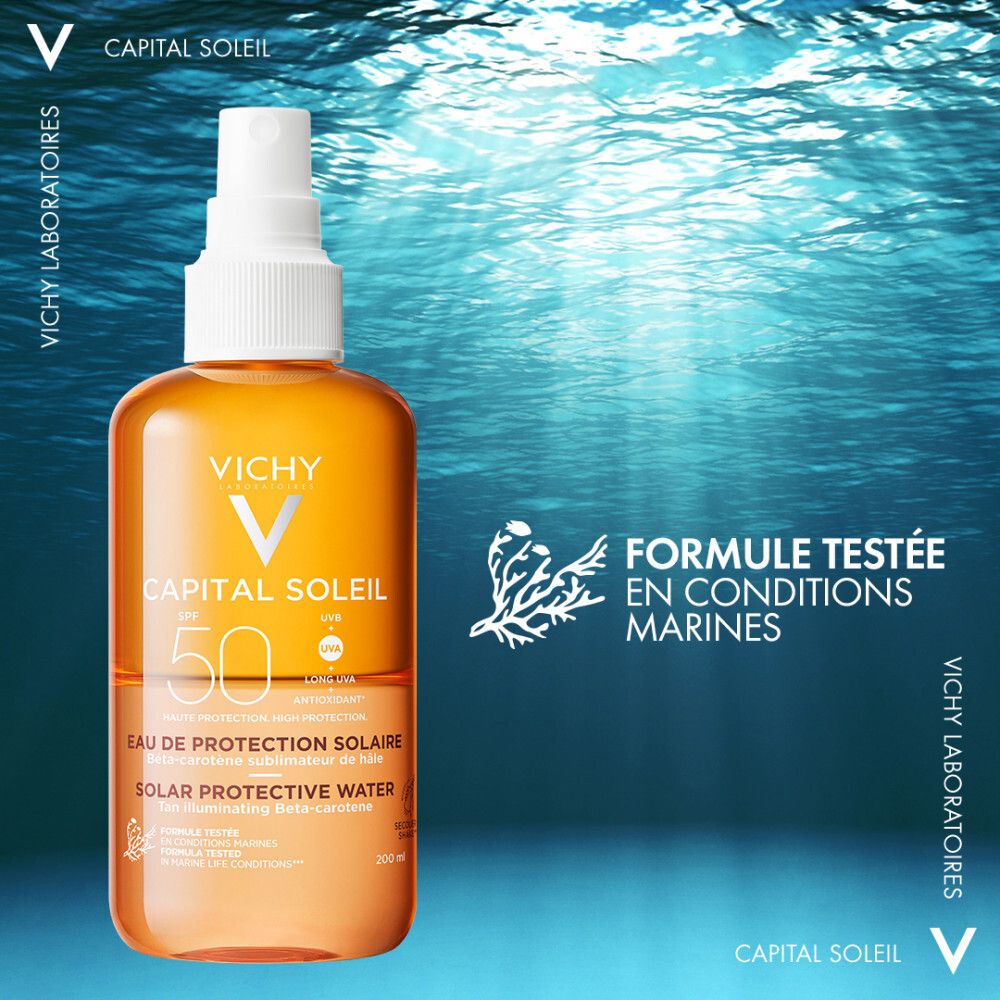 Vichy Capital Soleil Eau de protection solaire SPF50. Flacon orange avec vaporisateur. Nom du produit et SPF50 visibles.