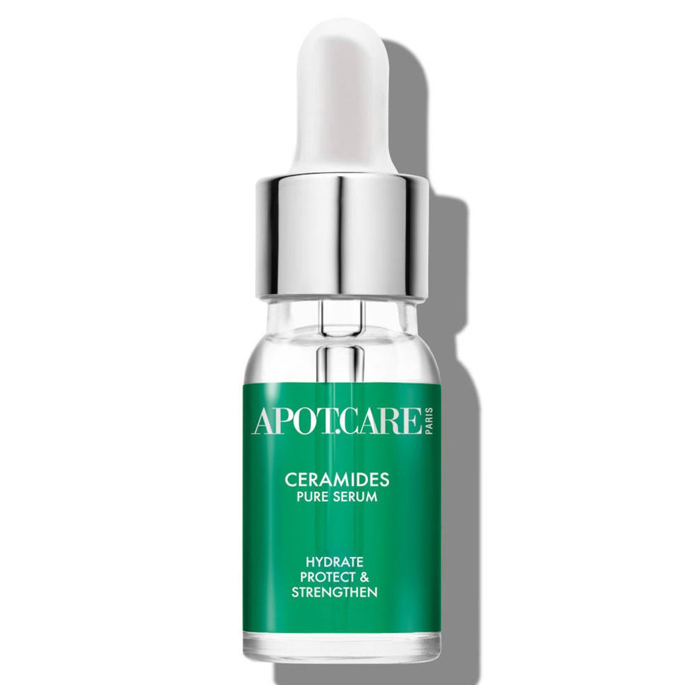 Flacon transparent avec sérum. Bouchon et pipette blancs. Inscription : APOT.CARE, Ceramides Pure Serum. Étiquette verte et blanche.