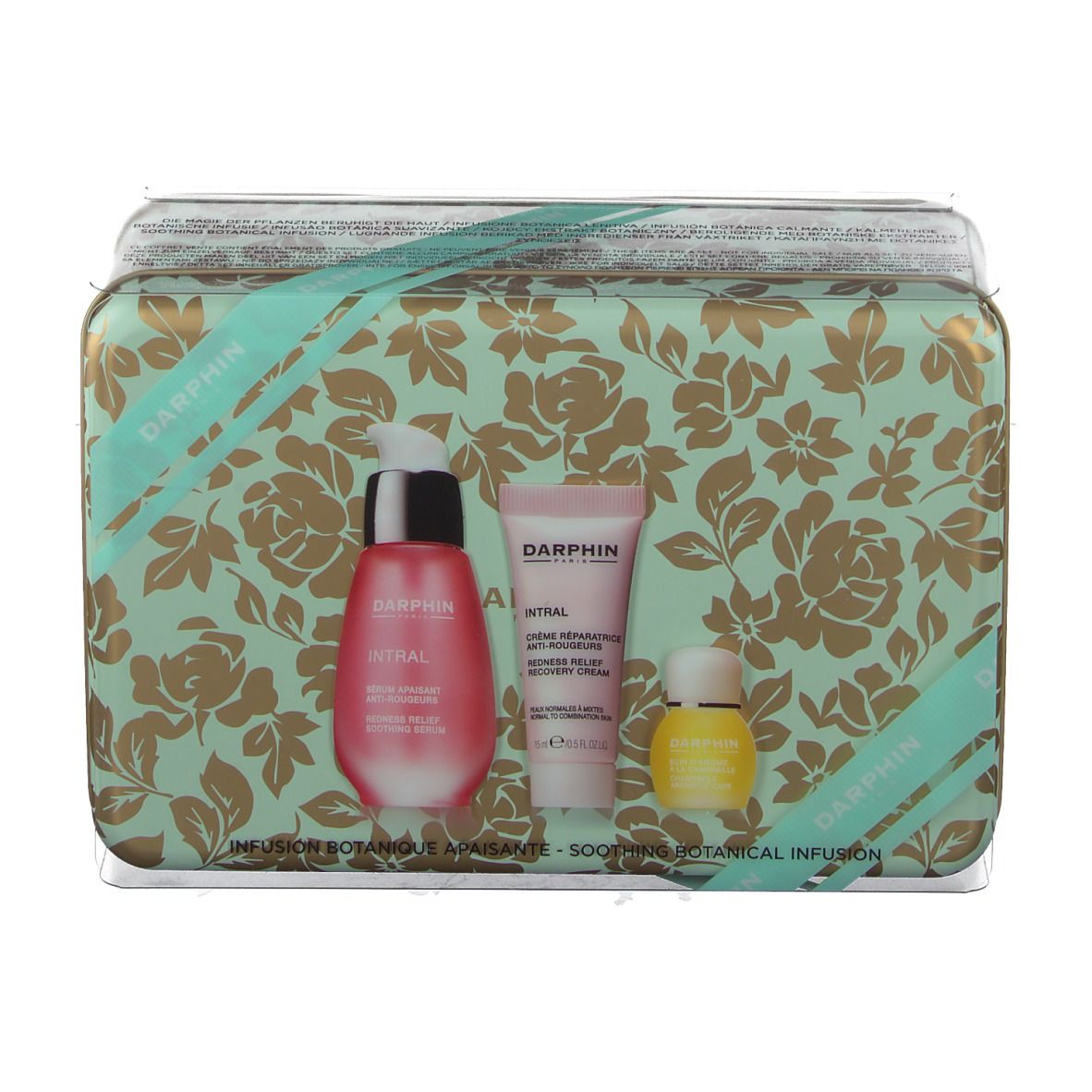 Geschenkdoos met bloemenpatroon, bevat serum, crème en olie. Merk: DARPHIN.