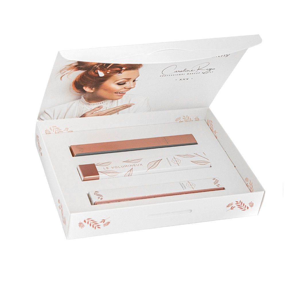 Coffret maquillage. Contient mascara, eye-liner et crayon. Emballage avec visage de femme.