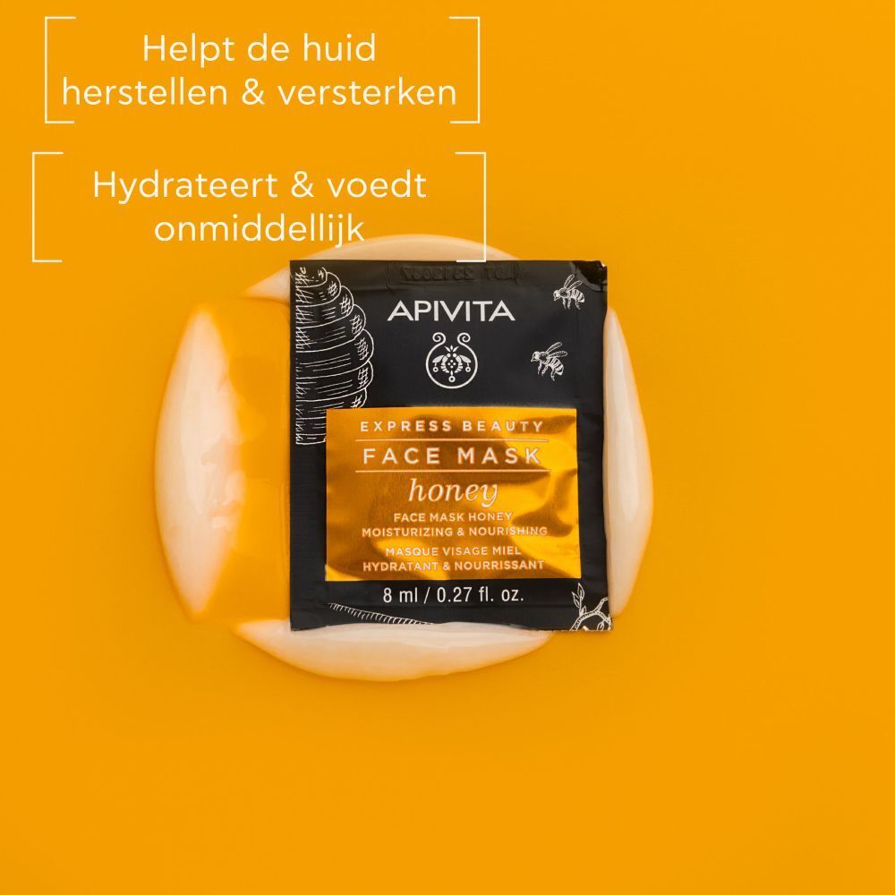 Zakje gezichtsmasker op gele achtergrond. Opschrift: Apivita Express Beauty Face Mask Honey. 8 ml / 0.27 fl. oz.