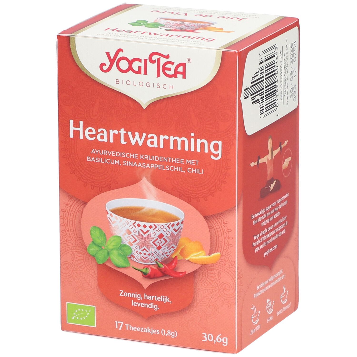 Yogi Tea®-Box. Aufdruck: Heartwarming, ayurvedische Kräutermischung. 17 Beutel, 30,6g. Mit Basilikum, Chili, Zimt.