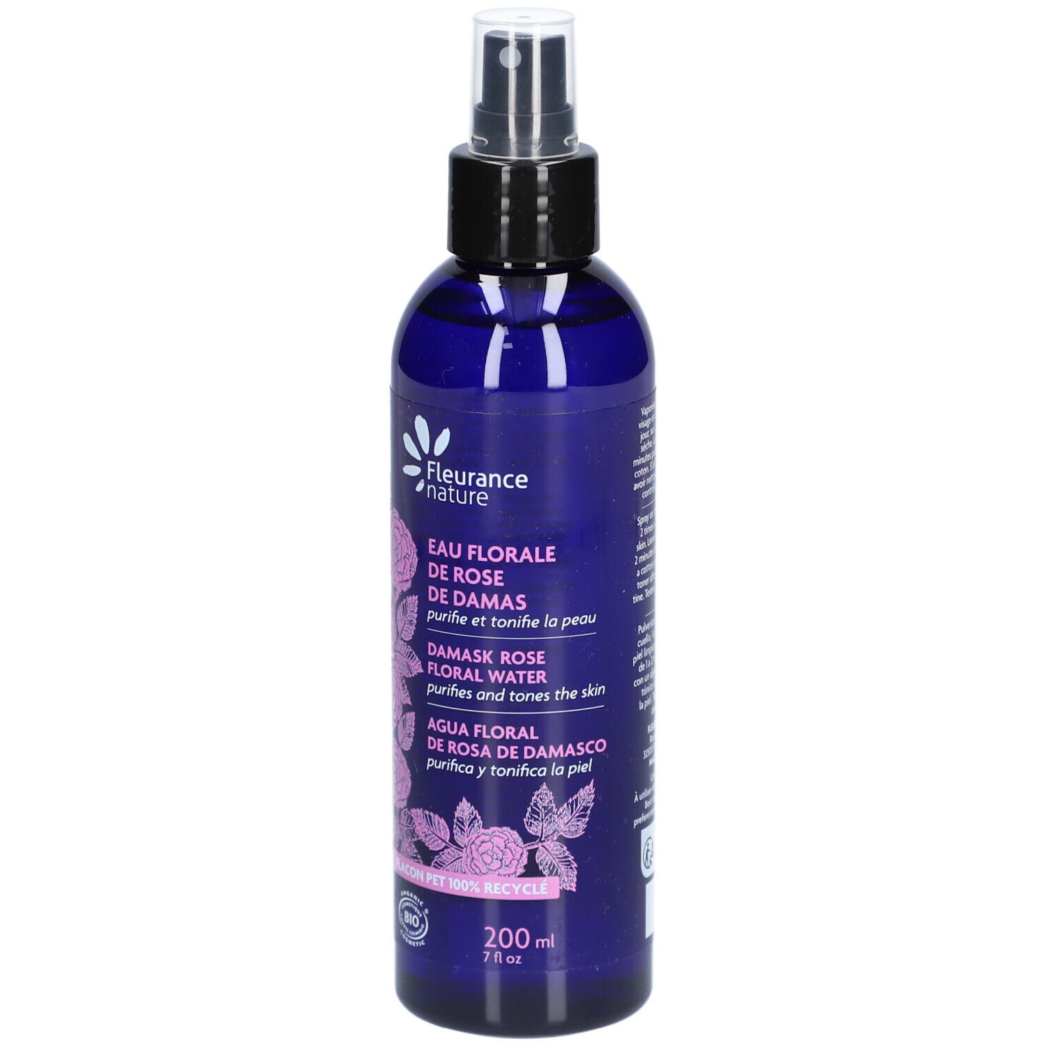 Blauwe fles met verstuiver. Opschrift: Eau Florale de Rose de Damas. Bio-certificering.