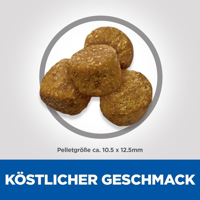 Nahaufnahme von Hundefutterpellets. Größe ca. 10,5 x 12,5 mm. Aufschrift: Köstlicher Geschmack.