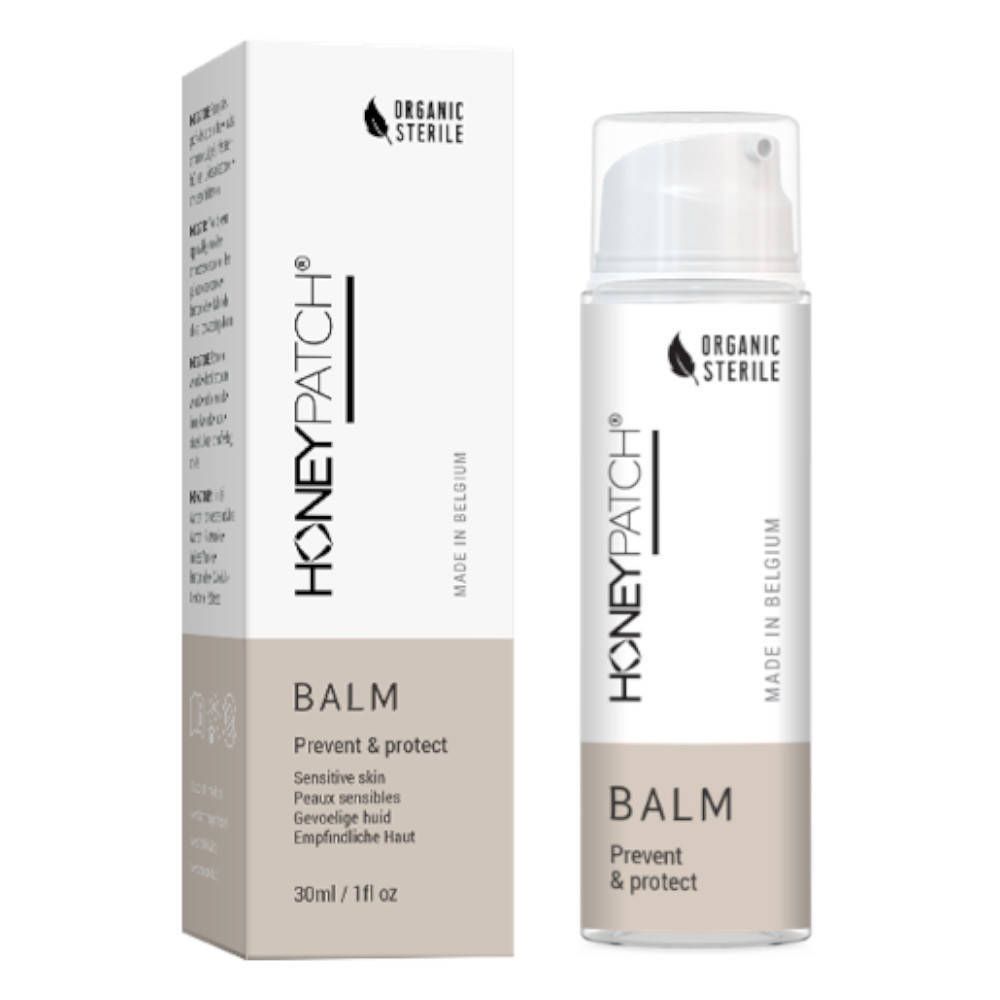 Flacon blanc avec pompe et carton. Inscription HONEYPATCH®, BALM, Prevent & protect. Fabriqué en Belgique. 30ml/1 fl oz.