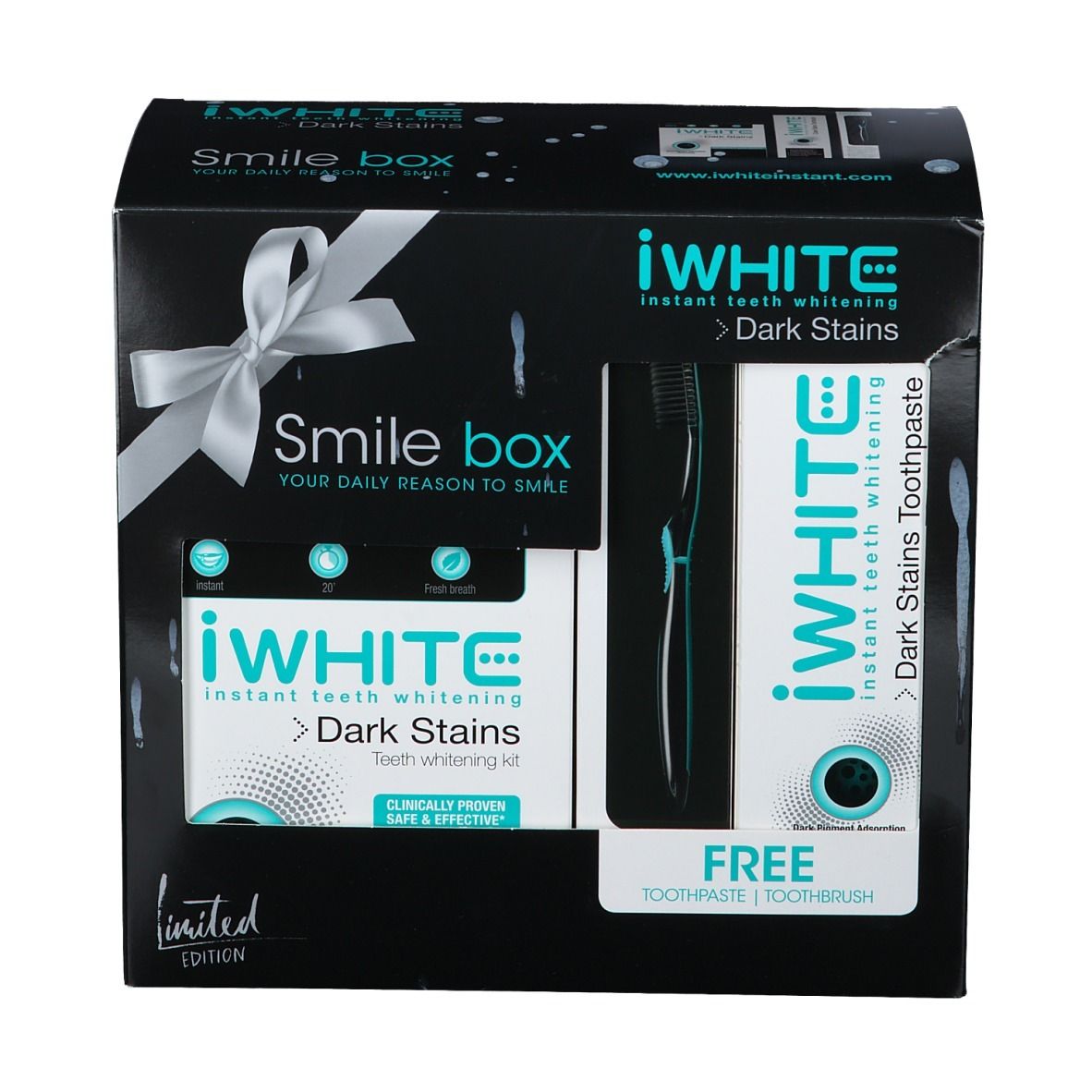 Coffret iWhite Dark Stains. Boîte noire avec ruban. Contient dentifrice et brosse à dents. Inscription "Smile box".