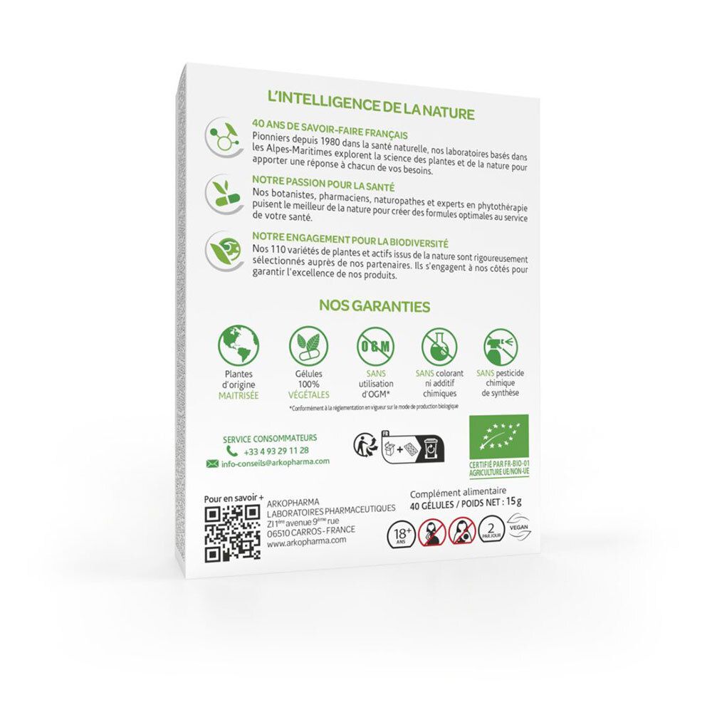 Achterkant van de witte doos. Tekst over het merk, garanties en certificeringen. Bevat productinformatie.