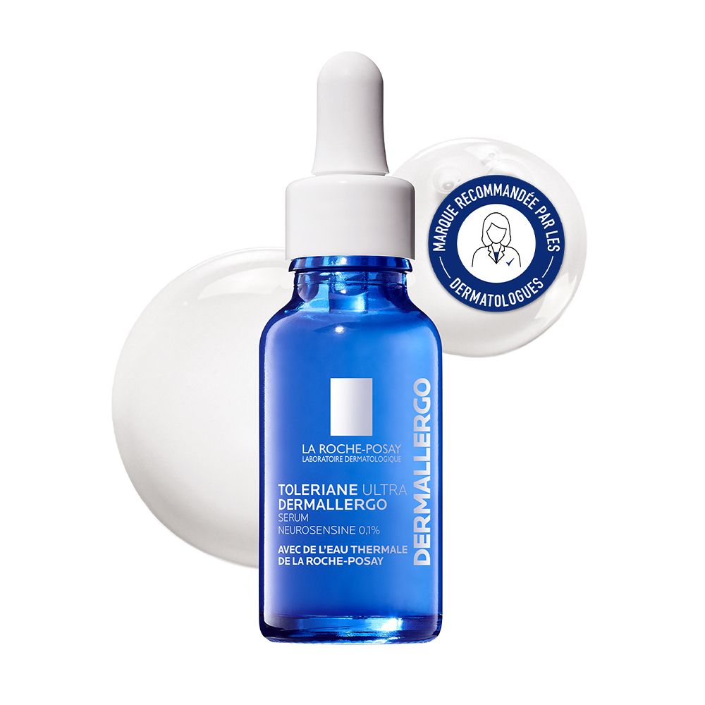 Flacon de sérum bleu avec bouchon blanc et pipette. Texte en français.