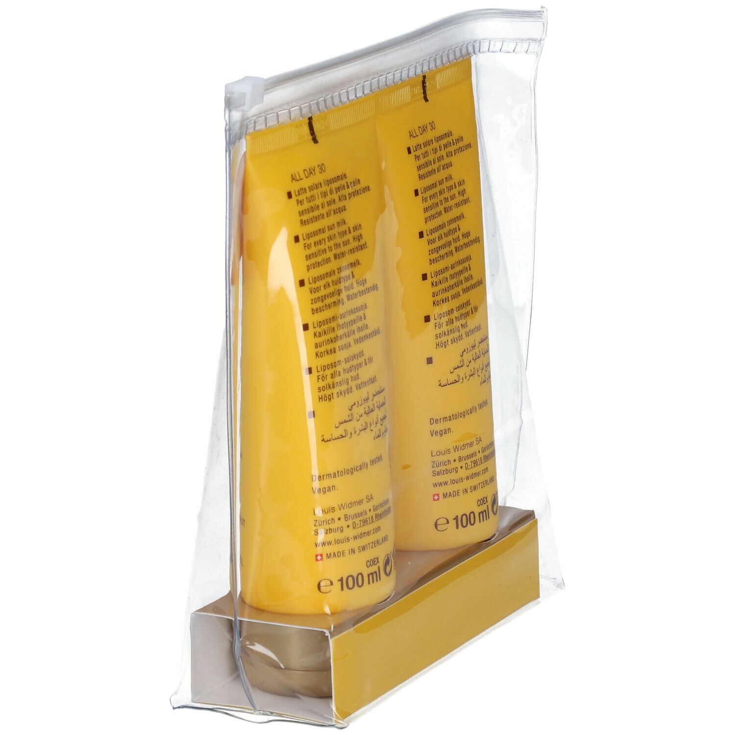 Deux tubes jaunes dans un sac transparent. Inscription : All Day 30, 100 ml. Emballage avec fermeture éclair.