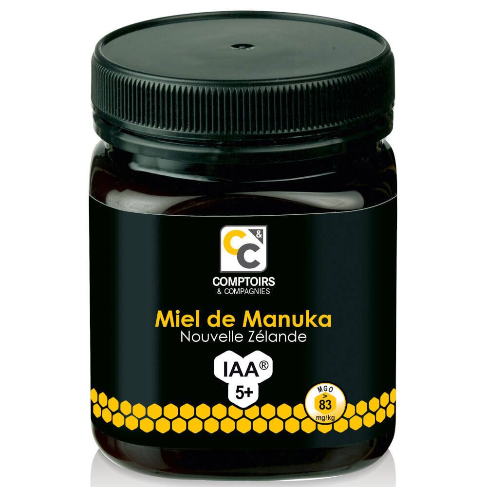 Pot Manuka honing. Zwarte deksel en etiket met productinfo. IAA 5+ en MGO 83 mg/kg.
