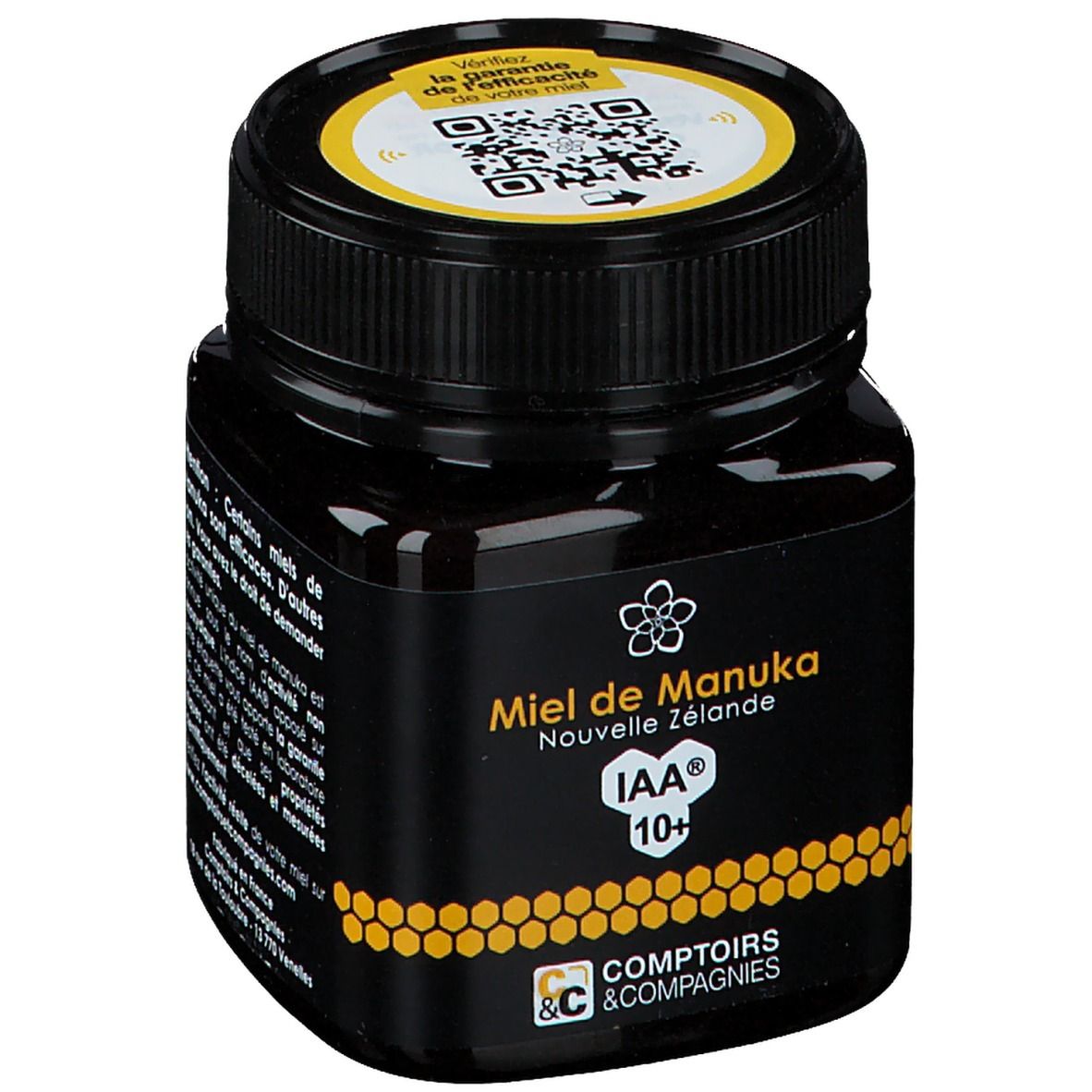 Zwarte pot honing. Opschrift: Miel de Manuka Nouvelle Zélande IAA 10+. Geel deksel met QR-code.