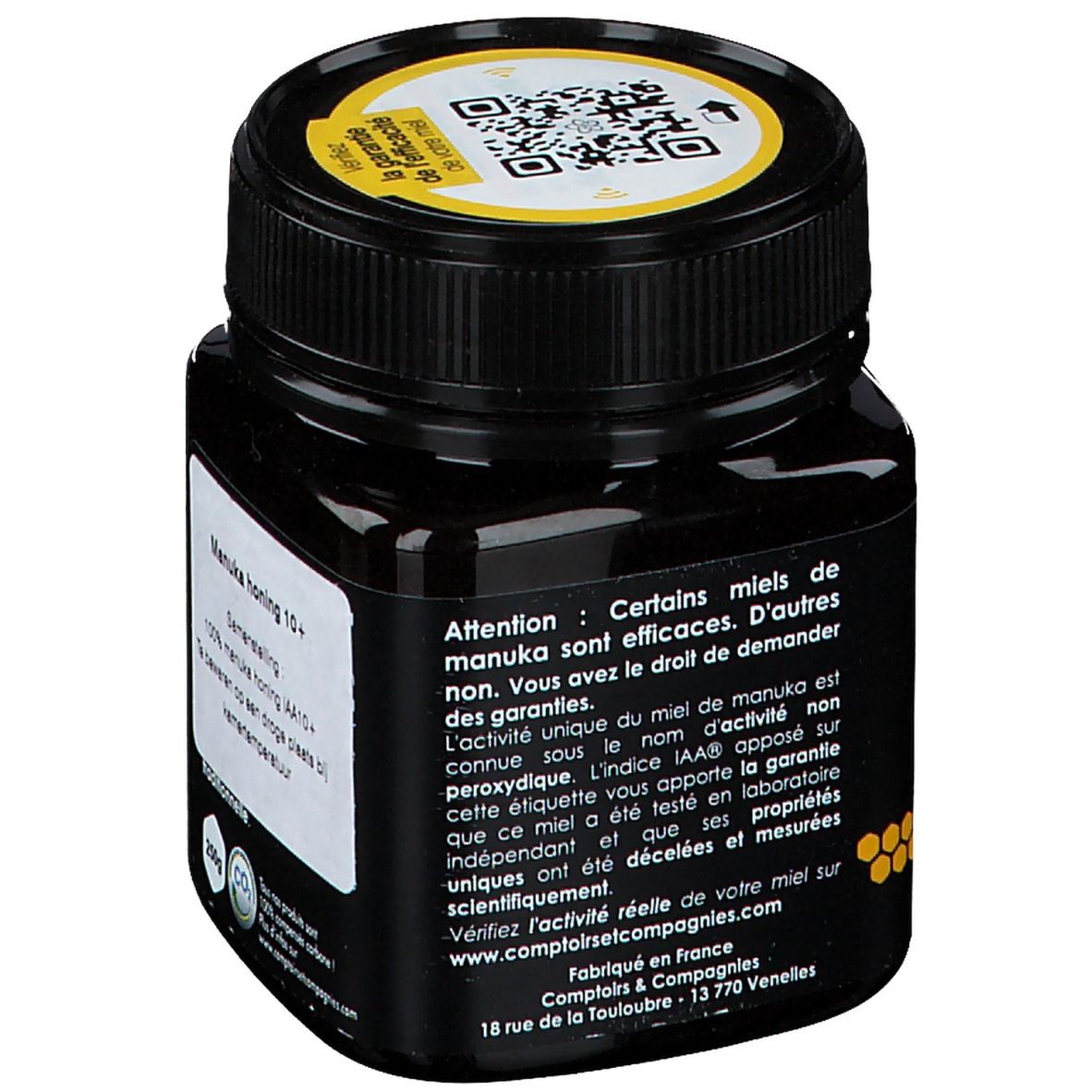 Zwarte pot honing. Opschrift: Manuka honing 10+. Geel deksel met QR-code. Tekst over de kwaliteit van de honing.