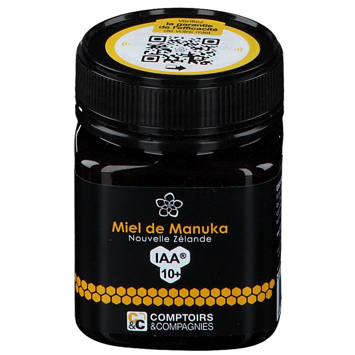 Zwarte pot honing. Opschrift: Miel de Manuka Nouvelle Zélande IAA 10+. Geel deksel met QR-code.