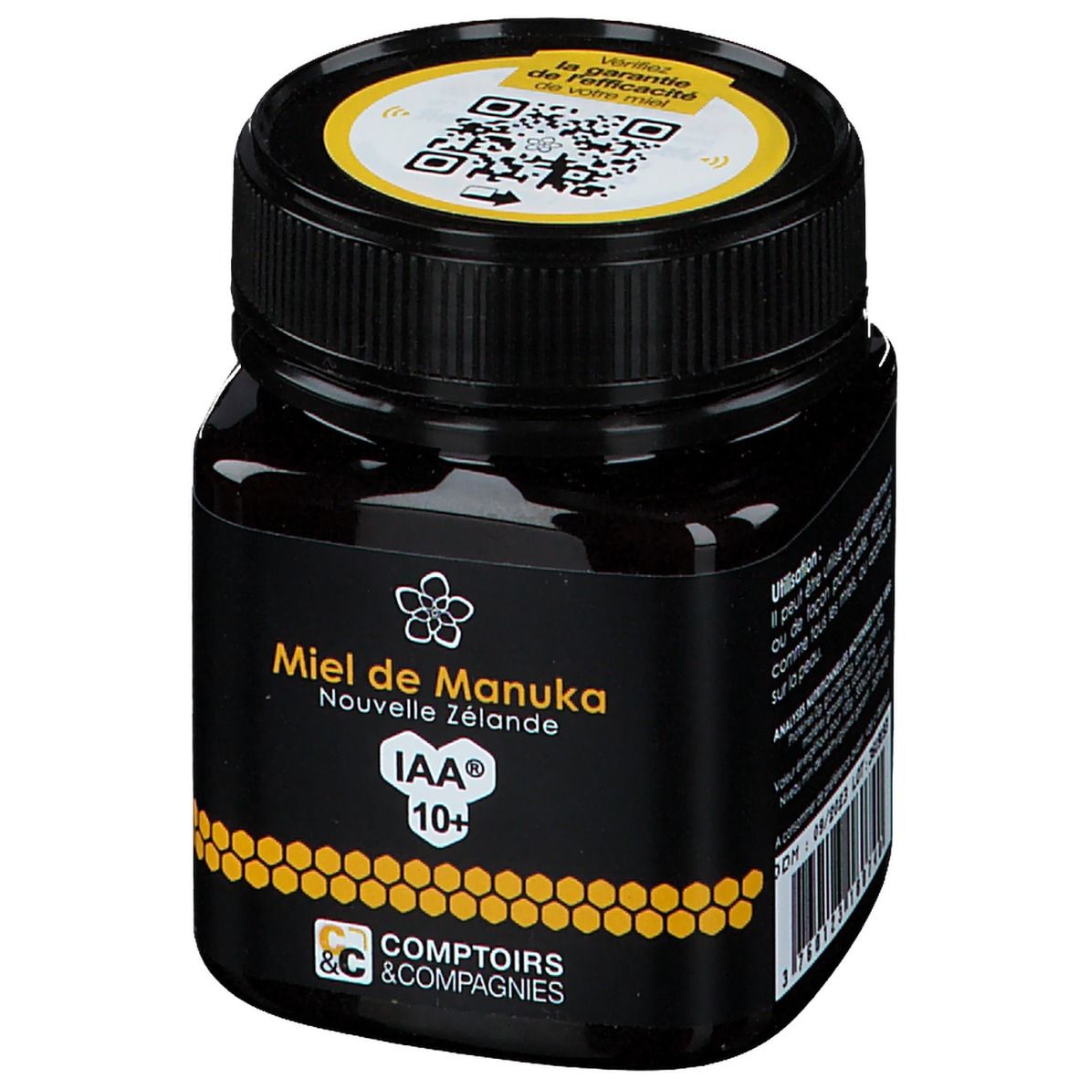 Zwarte pot honing. Opschrift: Miel de Manuka Nouvelle Zélande IAA 10+. Geel deksel met QR-code.