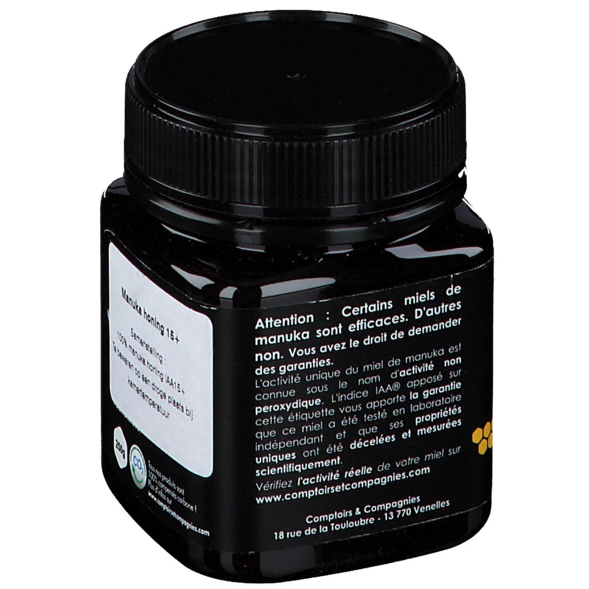 Pot noir de miel. Texte sur la qualité du miel. Manuka Honig 15+. Logo Comptoirs & Compagnies. Couvercle noir.