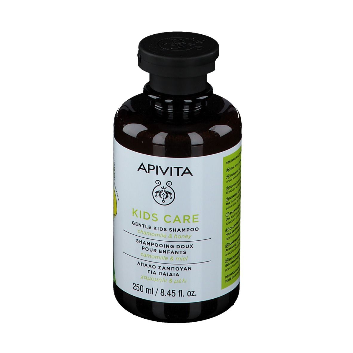 APIVITA KIDS CARE Shampoo-Flasche. Seite mit Text. Text: KIDS CARE, Kamille & Honig, 250 ml.