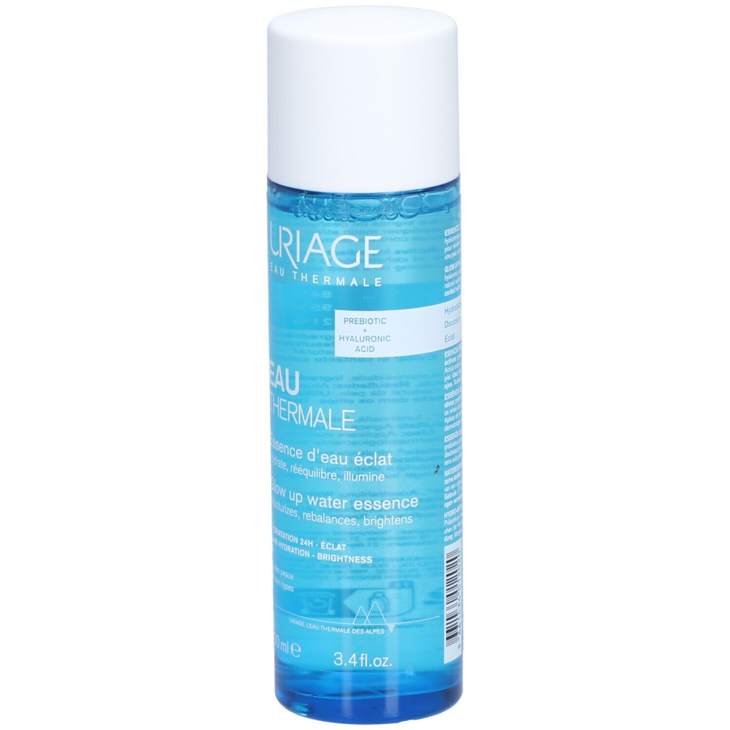 Uriage Eau Thermale Essence d'Eau Éclat. Flacon bleu, bouchon blanc. Texte sur le flacon.