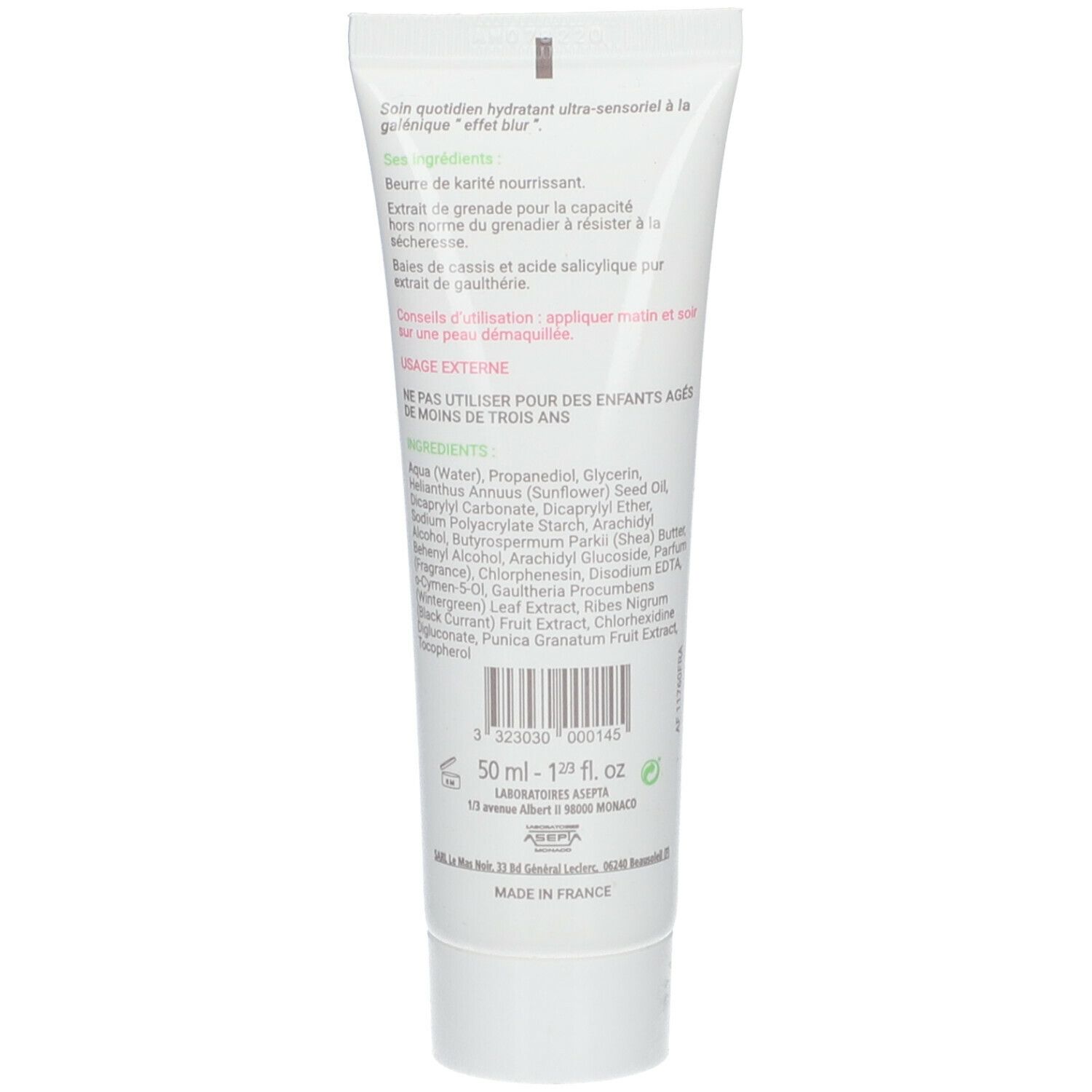 Achterkant van de witte tube. Tekst: Ingrediënten, 50 ml, Made in France. Met groene bladeren en bessen.