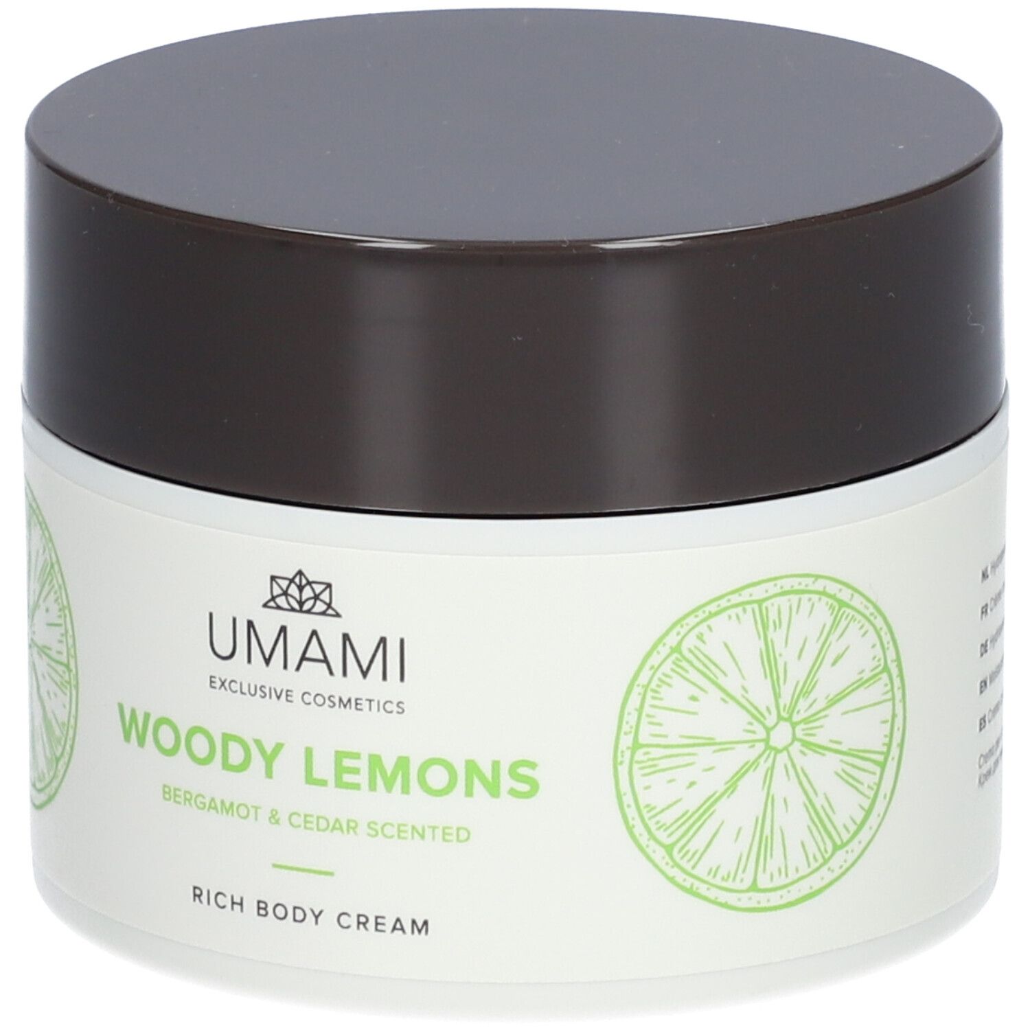 Creme-Tiegel mit braunem Deckel. Aufschrift: UMAMI Woody Lemons, Bergamote & Cèdre, Rich Body Cream. Limetten-Illustrationen.