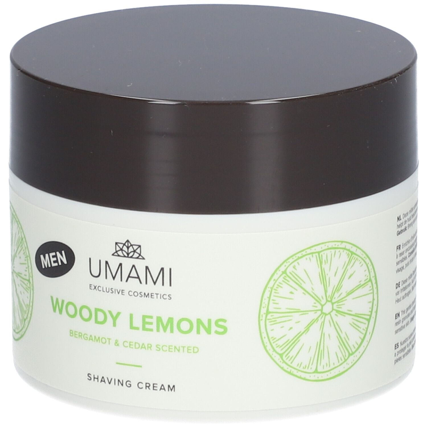 Cremebehälter mit Deckel. Aufschrift: UMAMI, WOODY LEMONS, Bergamotte & Cèdre, Rasiercreme. Abbildung von Limettenscheiben.