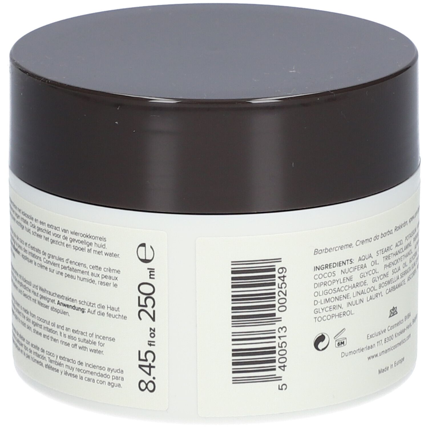 Crème pot met deksel. Opschrift: 250 ml, 8.45 fl oz, Scheercrème, ingrediënten. Lichtblauwe achtergrond met bladeren.